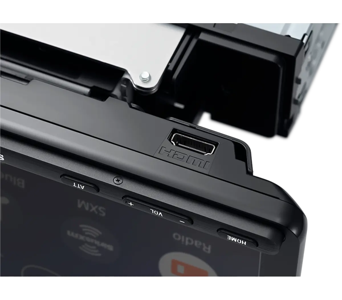 Sony XAV-AX8100 close-up of top edge of 8.95 inch screen panel showing HDMI input port with single DIN chassis mounting bracket visible above