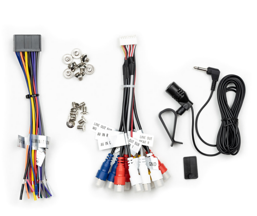 An automotive wiring harness kit laid out on a white background, including a multi-color wire harness, a white multi-connector harness, mounting hardware, a black inline choke, a black cable, and a small black rectangular component.