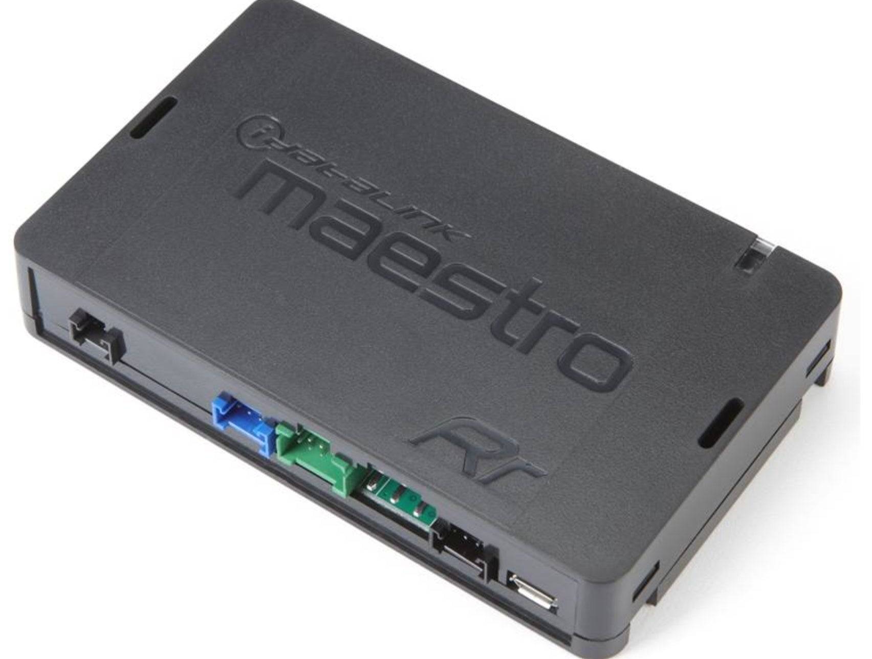 iDatalink Maestro ADS-MRR interface module angled view showing blue and green wiring harness connectors and USB port