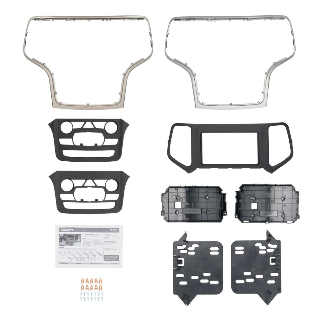 Metra 95-6562 complete dash kit contents including silver and tan dash panels, radio brackets, mounting plates, hardware, and installation instructions for Jeep Grand Cherokee

