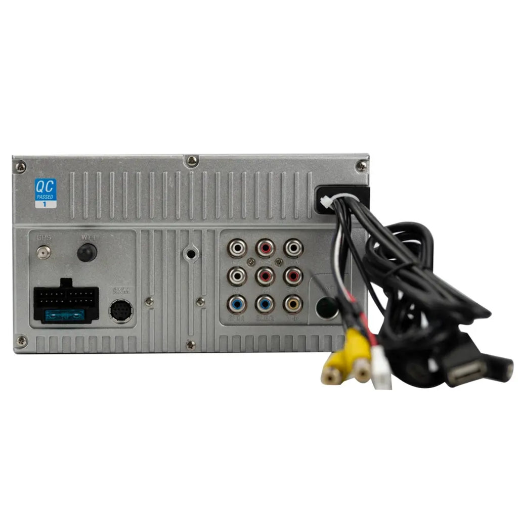 Rear view of a silver metal car stereo receiver with multiple audio and video input jacks and attached black cables on a white background.
