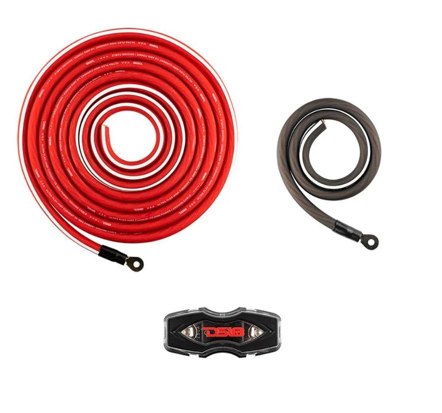 DS18 OFCKIT0 0-gauge OFC amplifier wiring kit power cable close-up showing 17-ft red 0-gauge OFC power cable coil with ring terminal, 3-ft gray OFC ground cable with ring terminal, and DS18 ANL fuse holder with clear cover