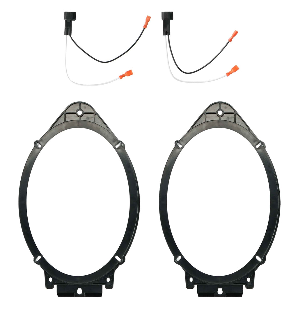 Metra 82-GM4 GM speaker adapter kit pair showing two oval 6x9 speaker mounting brackets and two speaker wire harnesses with orange quick-connect terminals for GM vehicles
