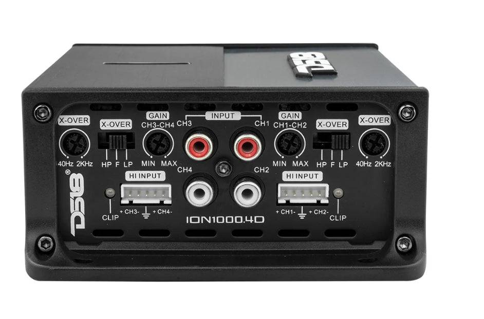 DS18 ION1000.4D signal input panel showing X-OVER switches 40Hz to 2kHz with HP F LP modes for CH3-CH4 and CH1-CH2, gain knobs MIN to MAX, four RCA inputs, HI INPUT speaker-level connectors, CH3 CH4 and CH1 CH2 speaker output terminals, clip LEDs, and ION1000.4D model name